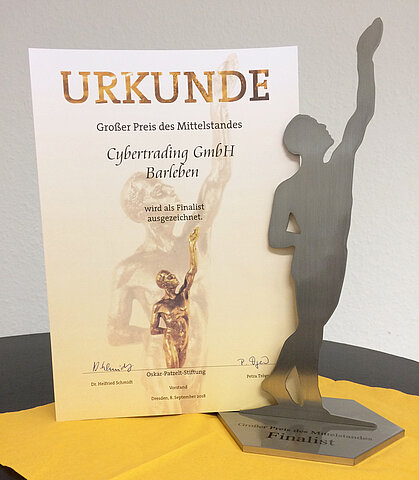 Certificate & trophy of the "Großer Preis des Mittelstandes" 2018