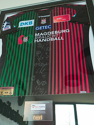 SCM jersey with signatures