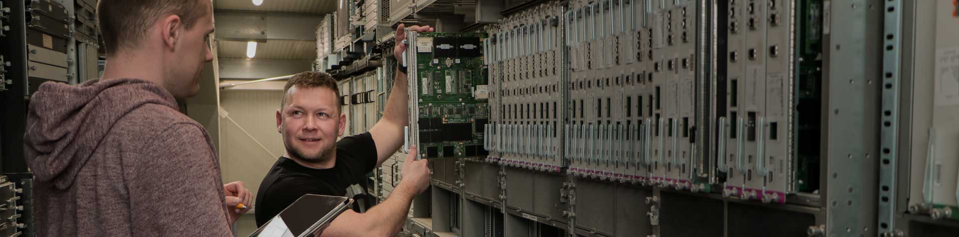 Employees checking the hardware