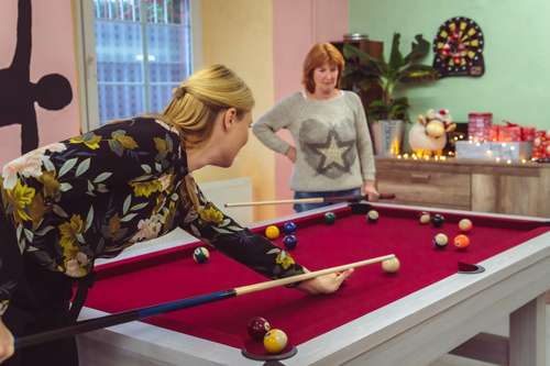 Cybertrading employees inaugurate the pool table with a game