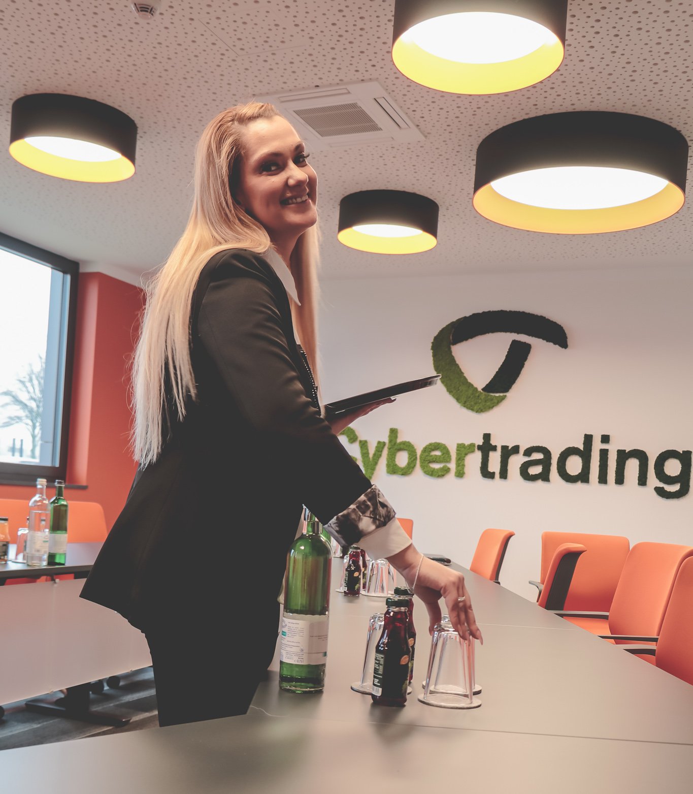 Female employee standing in a conference room